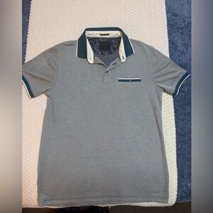 Men's Teal Polo Shirt with Contrast Navy Trim and Pocket Accent